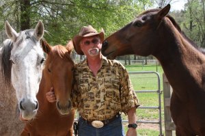 Author R.T. Fitch with his equine companions and real-life charactors from the book, Harley, Pele and Bart "Can you hear me now?"