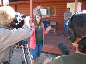 BLM contractor Sue Cattoor interupts news briefing at Pryor Mountain gather to expalin that her "feelings were hurt" by recent disclosures through news stories.  Filmed by Ginger Kathrens and Makendra Silverman.  (Photo by R.T. Fitch)
