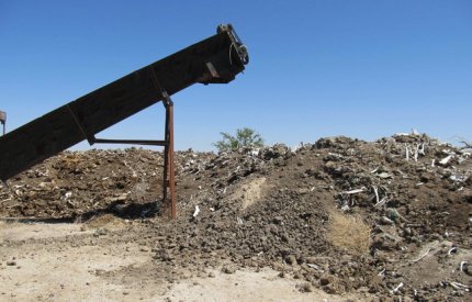 Piles of cattle bone and offal at a New Mexico slaughterhouse, now seeking to process horses for human consumption. - photo by Troy Grant/New Mexico Solid Waste Bureau