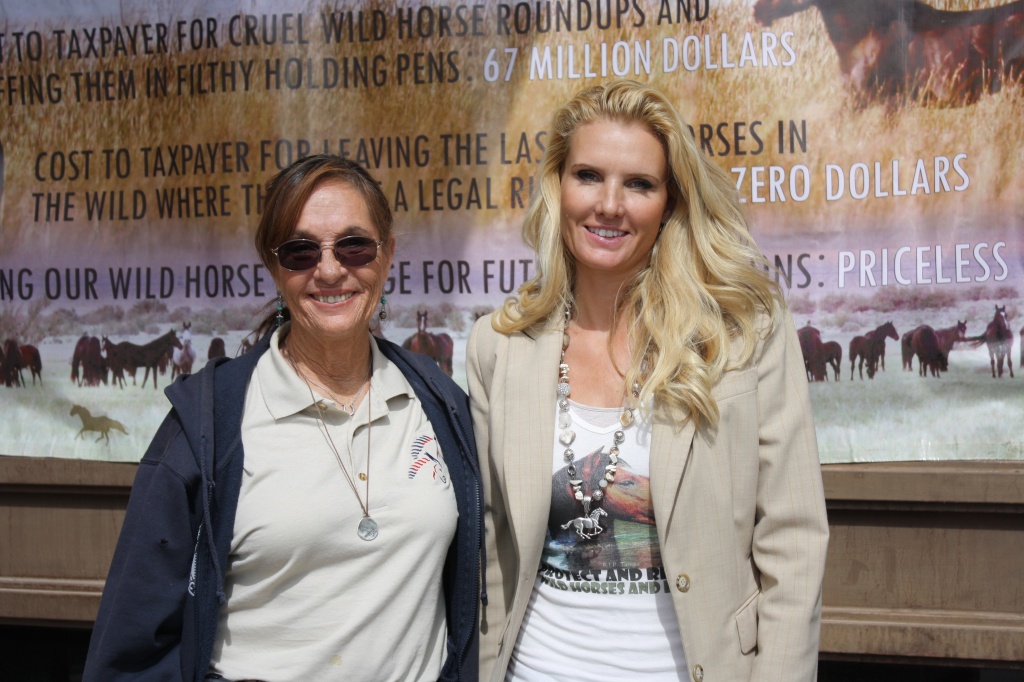 Marjorie Farabee and Simone Netherlands were two of the protesters at the BLM Wild Horse Advisory Board meeting today at CWC. (Ernie Over photo)